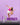Dancer in a pink top and white shorts against a purple background with 'Impact Dance Studio' branding.